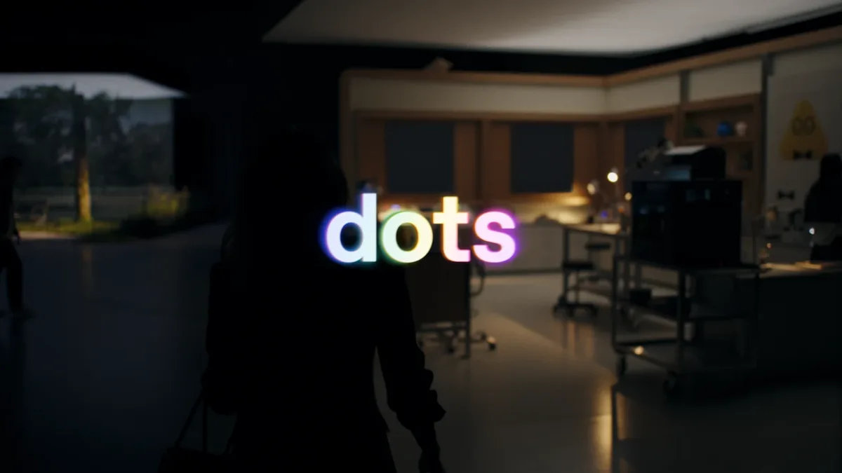 어두운 사무실을 배경으로 dots 로고가 떠 있는 오픈AI 데브데이 발표 이미지